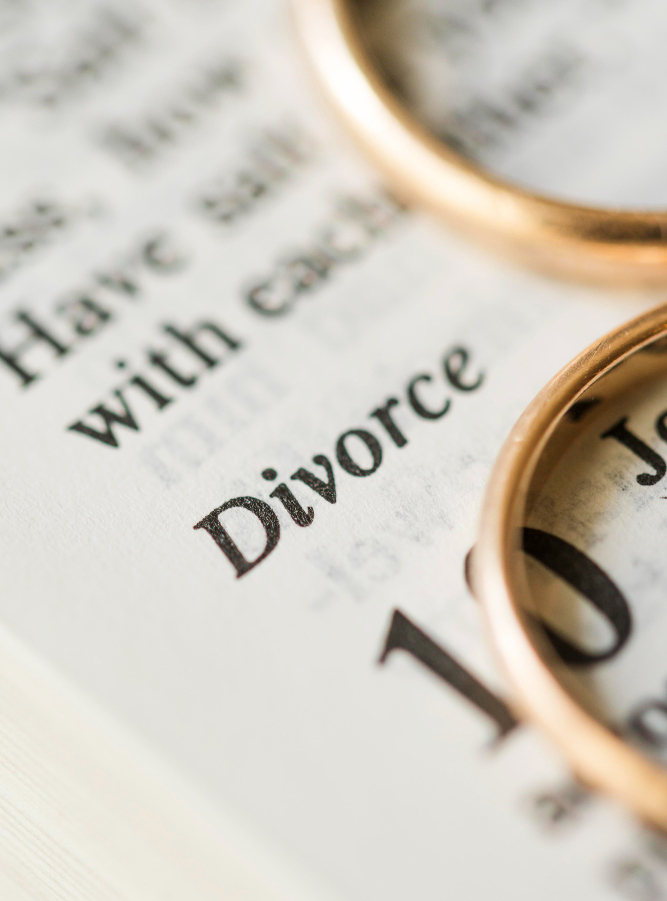 Massachusetts divorce law – wedding rings on divorce document